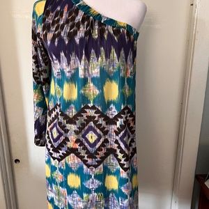 Ranch’s Estancia multi color half shoulder mini dress. Size L